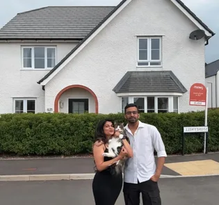 Happy couple after moving into new home